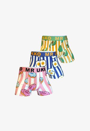 Trois paires de boxers en coton avec des ceintures élastiques. Les designs présentent des avocats, des œufs et des donuts avec des couleurs vives et des rayures.