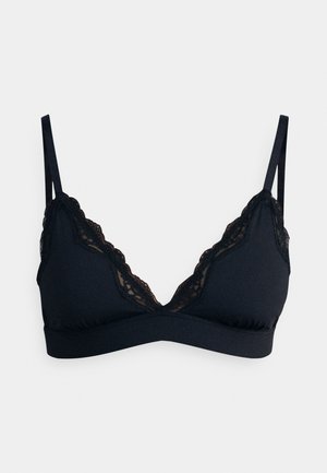 Black bralette featuring a lace trim along the neckline, soft fabric, removable padding, and adjustable straps for a comfortable fit.