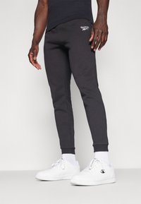 Reebok IDENTITY SMALL LOGO JOGGER - Donji dijelovi trenirke - black