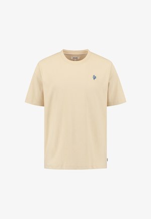 Béžové bavlnené tričko s okrúhlym výstrihom, krátkymi rukávmi a malým modrým vyšitým dizajnom na ľavej hrudi. Jednoduchý a uvoľnený strih.