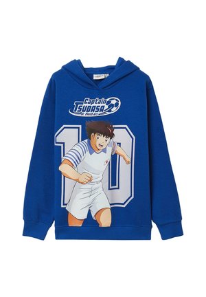 Felpa blu con logo "Captain Tsubasa", grande numero 10 e calciatore animato in azione che indossa un'uniforme bianca con patch della bandiera giapponese.
