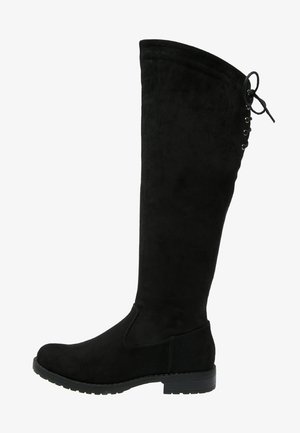 Botte noire en daim montant jusqu'au genou, avec un bout arrondi, une semelle plate et un détail de laçage décoratif à l'arrière. Texture lisse et design simple.