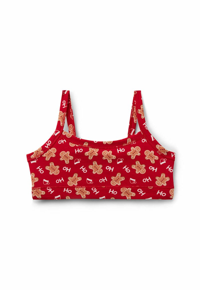 Červený crop top s opakujícím se vzorem perníčků a nápisem "Ho". Vyroben z měkké látky, má úzká ramínka a těsný střih.