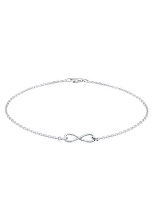 Delicate silver chain bracelet with a small infinity symbol charm and lobster clasp closure on a white background.