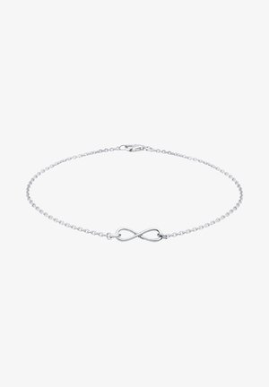 Bracelet en chaîne d'argent délicat avec un petit pendentif symbole de l'infini et une fermeture avec fermoir mousqueton sur fond blanc.