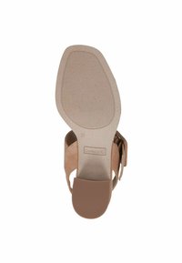 Tan suede hoge sandaal met een gestructureerde rubberen zool, open achterkant, verstelbare band en gegraveerd logo op de binnenzool. Maat 37.