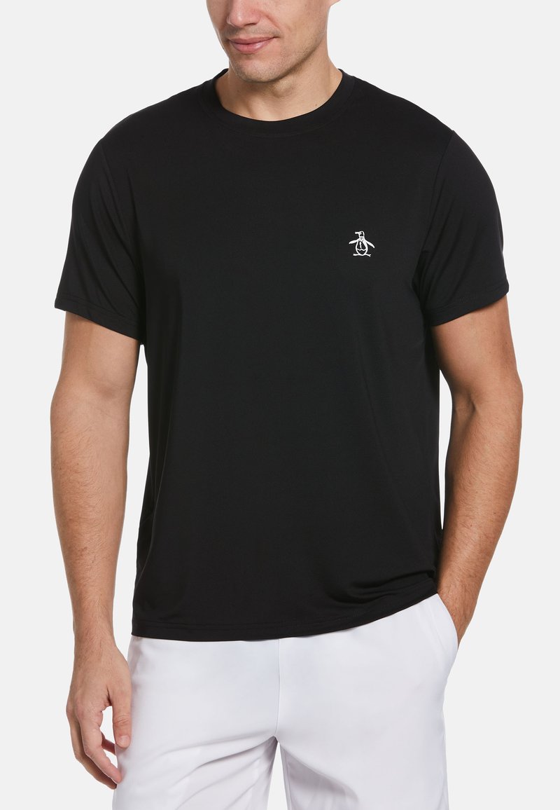 Zwart T-shirt met korte mouwen van soepele stof, voorzien van een klein wit pinguïnlogo op de borst. Eenvoudig, klassiek ontwerp.