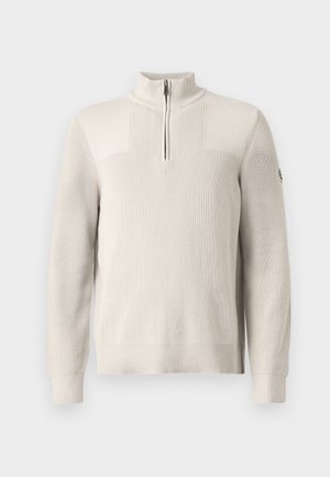 Pulover tricotat de culoare bej deschis, cu fermoar la un sfert, guler, mansete și tiv cu nervuri, având un mic patch pe mânecă stângă.