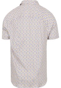 Korte mouw shirt met een multikleurig geometrisch patroon op een lichte achtergrond, met een kraag en een relaxte pasvorm.