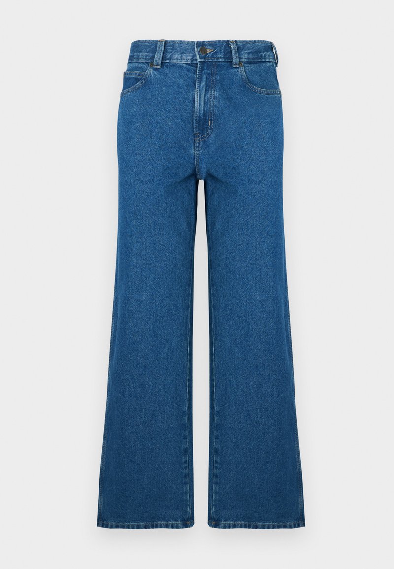 Wide-leg jeans in blue denim. Features classic five-pocket design, button closure, and faded texture. Straight hem with subtle stitching details.
