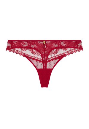 Culotte en dentelle rouge avec motifs floraux et un petit pendentif décoratif doré au centre devant, présenté sur un fond blanc.