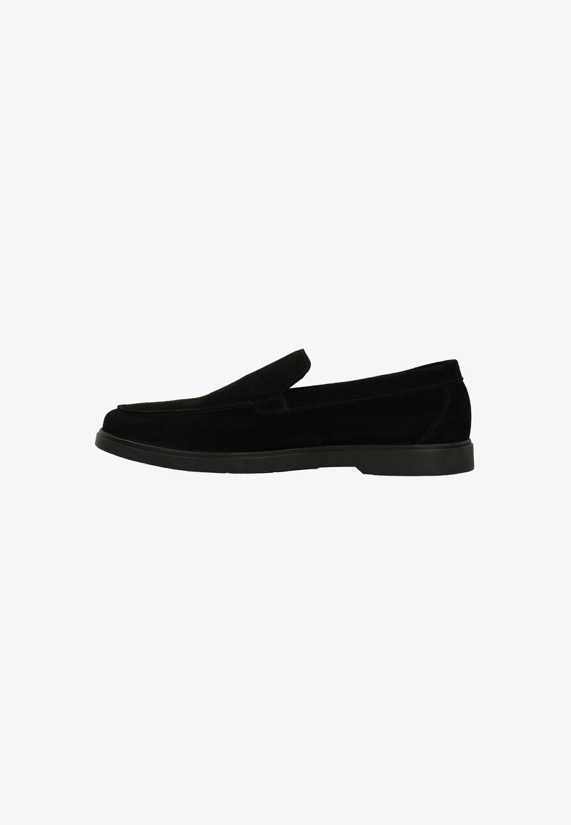 Black suede loafers with a rounded toe and slip-on design. Features a flat rubber sole and subtle stitching accents along the upper.