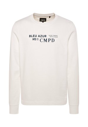 Cream-colored sweatshirt with long sleeves and round neckline. Features navy blue text: "BLEU AZUR NO/1 CMPD" with a Saint-Tropez design.
