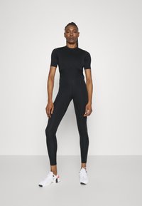 Nebbia NEBBIA WOMEN'S WORKOUT JUMPSUIT - Turnpak - black
