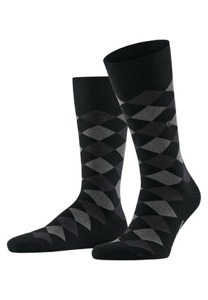Calcetines de patrón de diamante en negro y gris, hechos de un material suave, que ofrecen un ajuste cómodo y un borde acanalado para mayor estructura.
