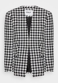 Svartvit houndstooth-blazer med notched lapel, öppen framsida och texturerat tyg. Fodrad insida med etikett synlig vid halslinningen.