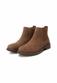 Botas de tobillo de ante marrón con paneles laterales elásticos, puntera redonda y tacón apilado. Presentan un detalle de costura en contraste alrededor de la suela.