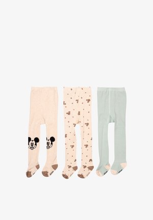 Drei Paare Kinderstrumpfhosen: hellbeige mit schwarzem Mickey Mouse, beige mit braunen Punkten und ein einfarbig hellgrünes Paar.