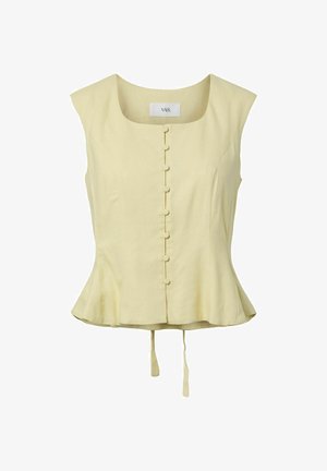 Varrukateta helekollane pluus, ümar kaelus, ees kaetud nööbid, kerge peplum-ääris ja kaks rippuvat kangast paela seljal.