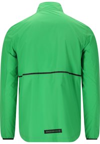 Veste légère verte avec col montant, poignets élastiques et une bande noire sur le dos. Caractéristiques de la marque "ENDURANCE".