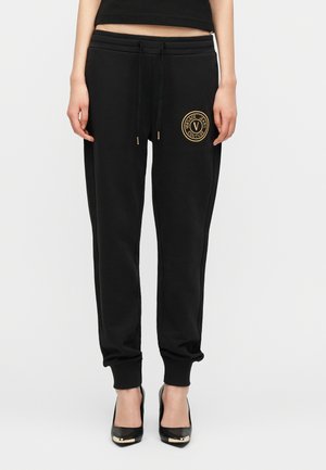 EMBLEM EMBRO - Jogginghose - black/gold-coloured