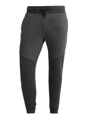 Pantalones de chándal grises con acentos negros, ajuste tapered, cinturilla elástica con cordón, bolsillos laterales y paneles de tela texturizada.