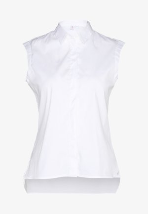 Witte, mouwloze blouse van katoen met een knoopsluiting aan de voorkant, puntige kraag en een gebogen zoom. Gladde textuur, geen patronen.