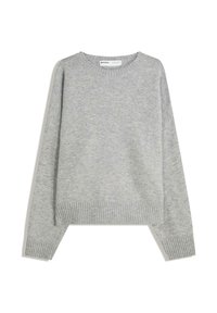Gray knit sweater with a crew neckline, ribbed cuffs and hem, featuring a relaxed fit and soft texture.
