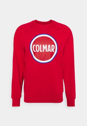 Rød langærmet sweatshirt med ribstrikkede manchetter og kant, med en stor rund logo med teksten "COLMAR" i hvid på brystet.