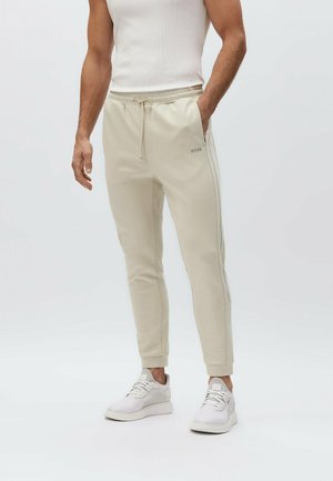 HADIKO - Pantalon de survêtement - light beige