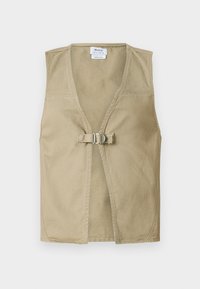 Beige ermeløs vest laget av slitesterkt stoff, med dyp V-hals, frontlukking med spenne og ren, minimal design.