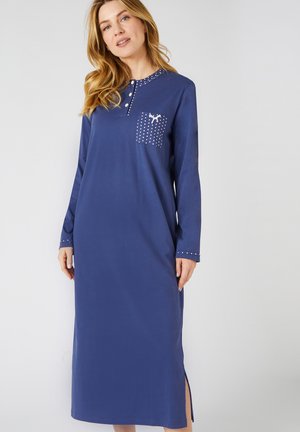 Abito blu a maniche lunghe con scollatura rotonda, bottone frontale, spacchi laterali e una tasca con un motivo a pois e decorazioni.