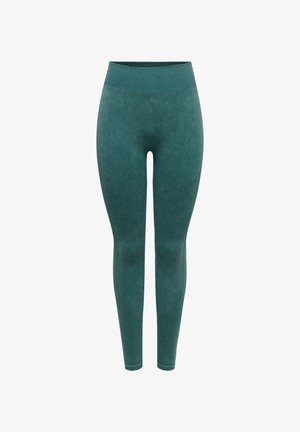 Türkisfarbene Leggings aus weichem, dehnbarem Stoff. Hoher Bund, glatte Textur, schlanke Passform, mit gerippten Details am Bund und an den Knöchelriemen.