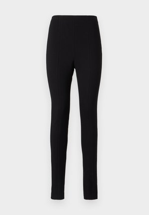 Black leggings featuring a fitted design, smooth texture, and vertical stitching details along the legs. No visible pockets or embellishments.