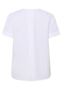 Blusa bianca a maniche corte con dettaglio sulla cucitura posteriore, vestibilità morbida e tessuto dalla texture soffice. Design semplice e minimalista senza motivi.