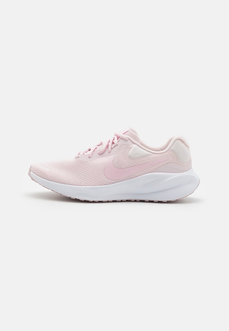 Light pink running shoe with breathable mesh upper, white midsole, and textured outsole. Features flat laces and Nike swoosh logo in matching color.