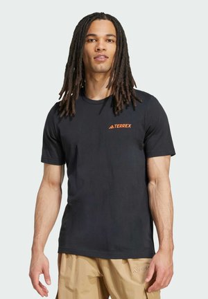 MOUNTAIN - T-shirt imprimé - black   semi impact orange