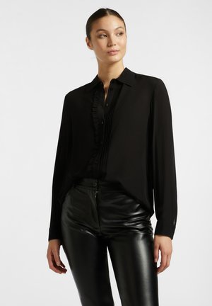 CON BORDO ARRICCIATO - Hemdbluse - nero