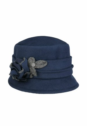 Navy blue wool cloche hat with a folded brim and decorative flower with gray accents and a small round metal emblem on the side.