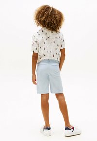 Tommy Hilfiger BELTED  - Shorts - breezy blue