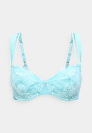 Soutien-gorge en dentelle bleu clair avec armatures, bretelles doubles réglables et un petit anneau argenté au centre devant.