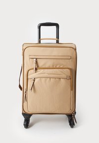 Tan wheeled suitcase with a retractable handle, front zipper pocket, and two side zippers. Made of durable fabric with smooth texture.