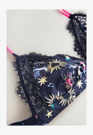 Zwarte kanten bralette met kleurrijke sterrenpatronen, met gouden zonnen, harten en een elastische roze band. Geïntegreerde kanten randen.
