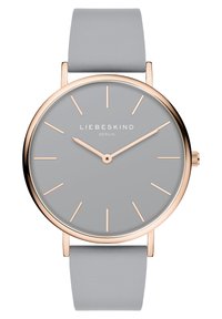 Runde Uhr mit einem grauen Zifferblatt und minimalistischen roségoldenen Stundenmarkierungen. Verfügt über ein weiches graues Lederarmband und einen eleganten vergoldeten Gehäuserand.