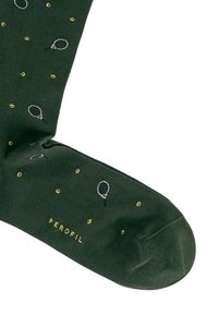 Calze in cotone verde con un motivo ripetuto di racchette da tennis e punti gialli, con una texture morbida e il logo "PEROFIL" in giallo.
