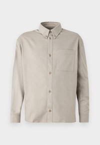 Camicia button-up di un beige chiaro realizzata in tessuto testurizzato, dotata di colletto a punta, maniche lunghe e una tasca sul petto.