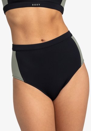 High-waisted swim bottoms featuring a color-block design in black and olive green. Made of smooth, stretchy fabric with reinforced seams.