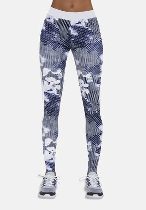 Legginsy w granatowo-białym kolorze z geometrycznym wzorem, zawierającym heksagonalne kształty i abstrakcyjne wzory. Gładki, elastyczny materiał.