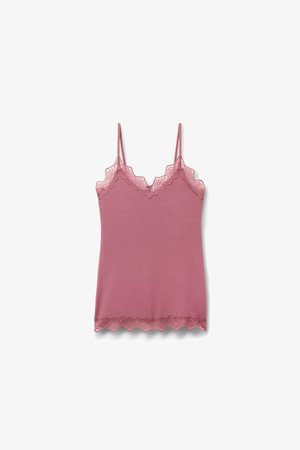 Stofroze camisole met kantafwerking langs de V-halslijn en zoom, voorzien van dunne verstelbare schouderbandjes.
