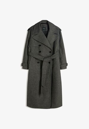 Dark gray wool double-breasted trench coat with wide lapels, shoulder epaulets, buttoned cuffs, and a matching fabric belt tied at the waist.